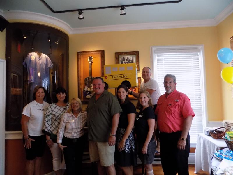 UWFK Board members and CEO Leah Stockton gathered with event supporters at the Kick-off party.